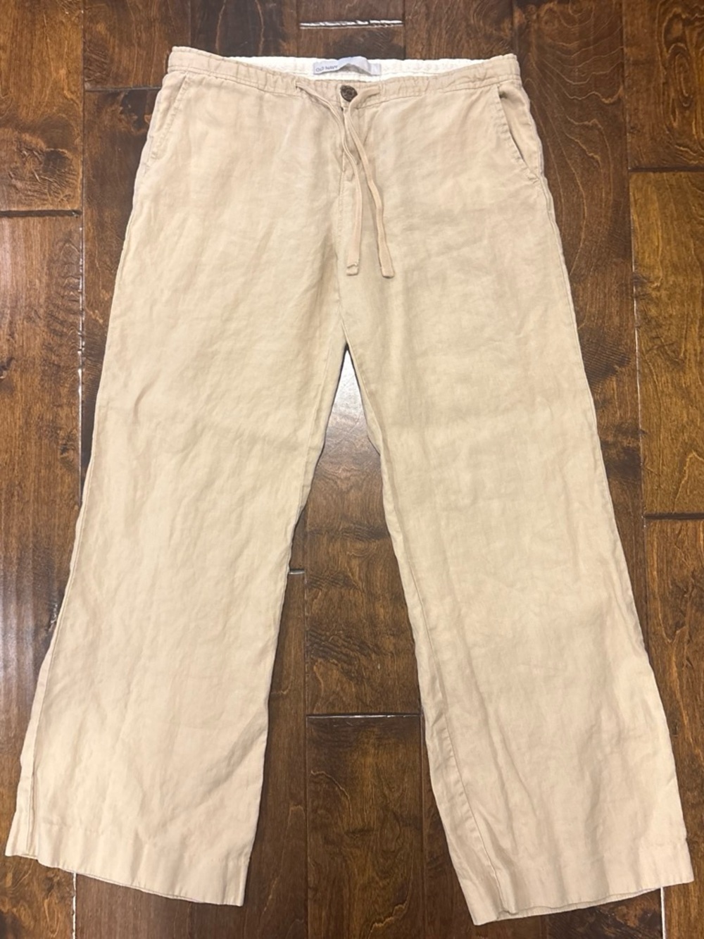100% linen, tan wide leg pants. Size 6